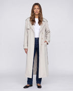 Women's cream long trench coat with notched lapels and button front