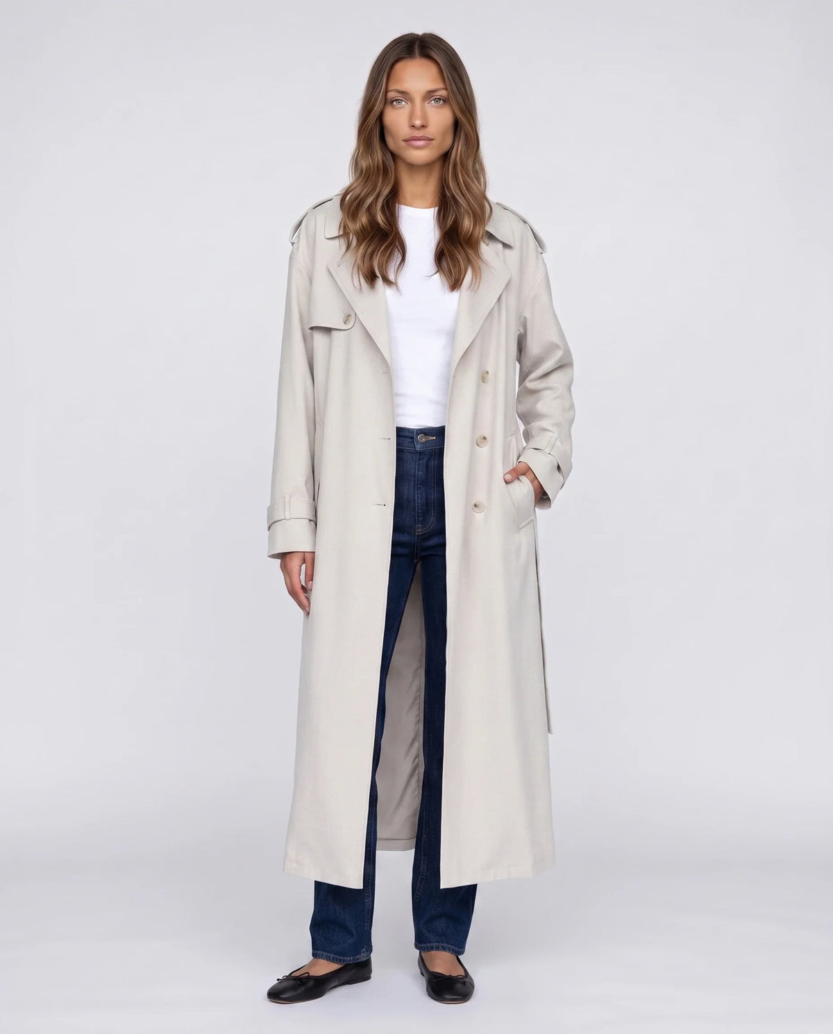 Women's cream long trench coat with notched lapels and button front