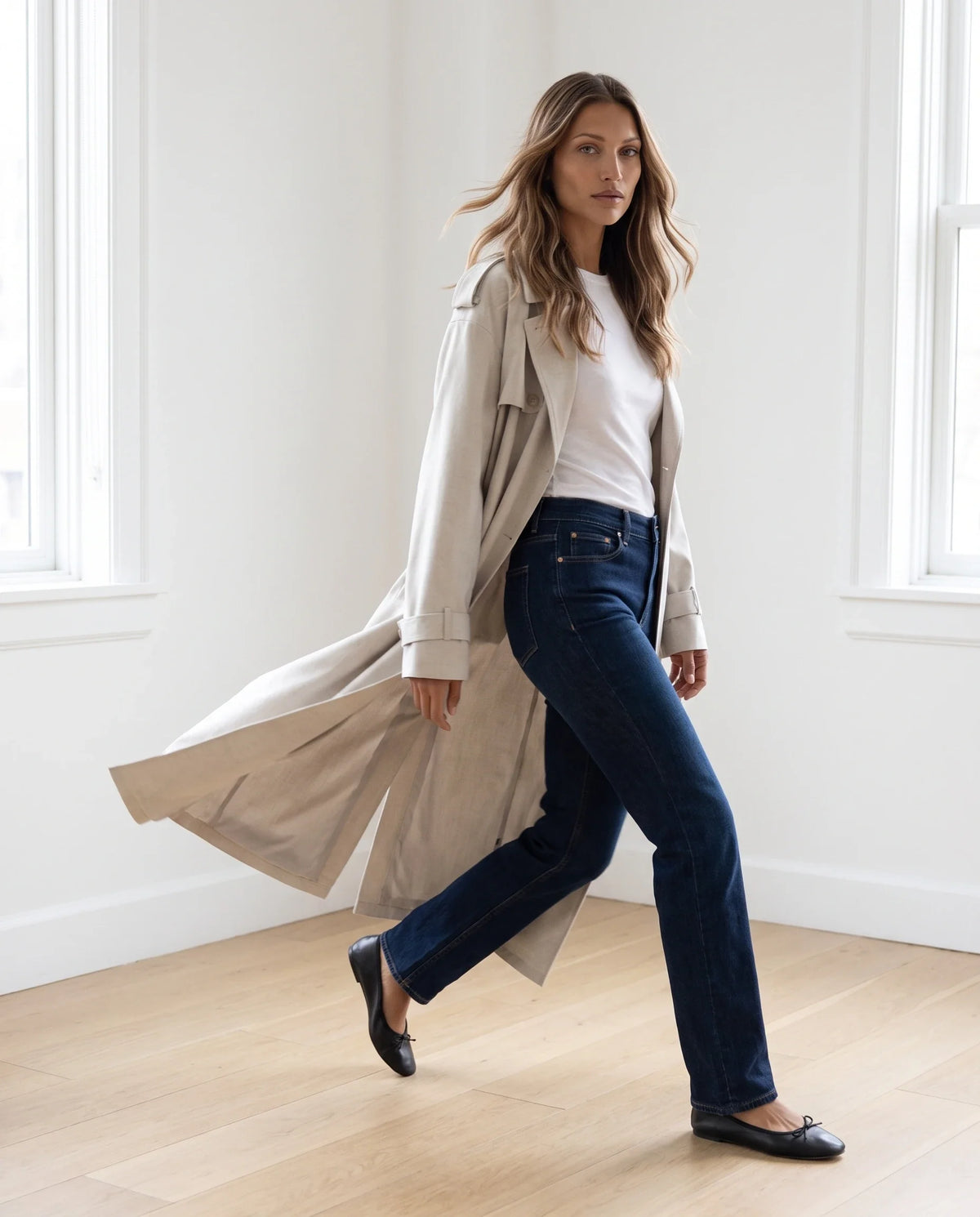 Women's cream long trench coat with notched lapels and button front