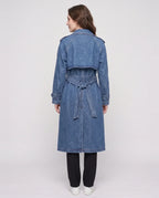 Women's long denim trench coat with lapels, buttons, belt and cuff straps