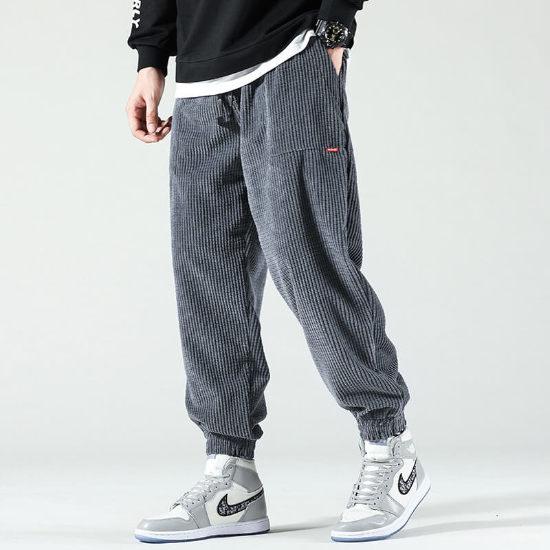 Men's ribbed corduroy trousers with drawstring waist and elasticated cuffs