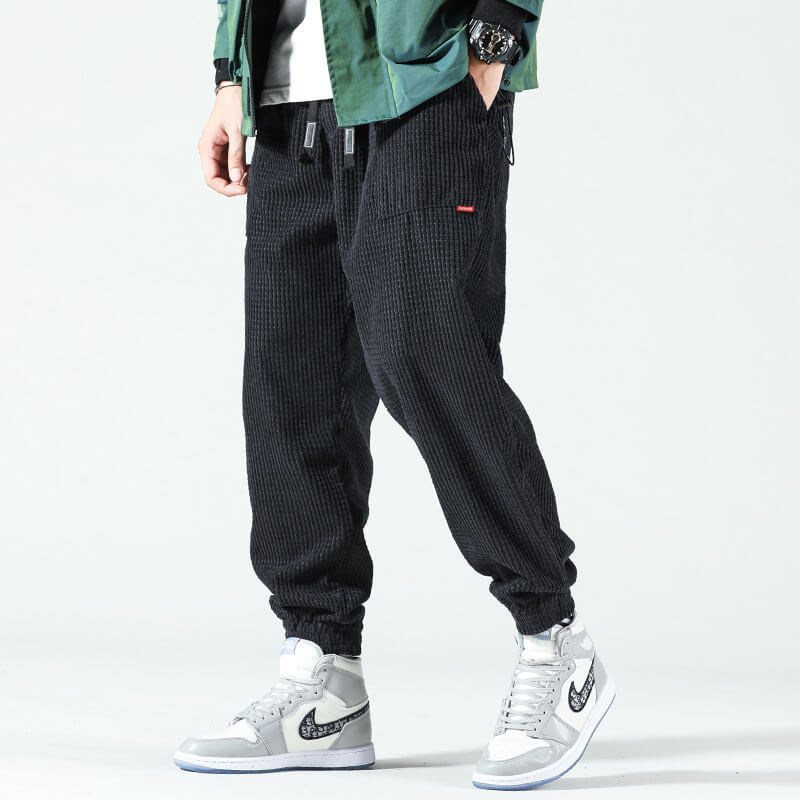 Men's ribbed corduroy trousers with drawstring waist and elasticated cuffs