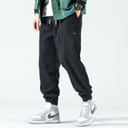 Men's ribbed corduroy trousers with drawstring waist and elasticated cuffs