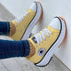 Women's lace-up platform sneakers with round toes and contrast soles