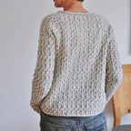 Women's grey textured crew neck sweater with long sleeves