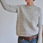 Women's grey textured crew neck sweater with long sleeves