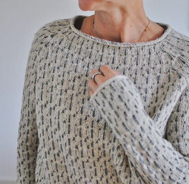 Women's grey textured crew neck sweater with long sleeves