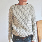 Women's grey textured crew neck sweater with long sleeves