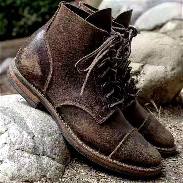 Men's lace-up ankle boots with rounded toes and stitched panel detailing