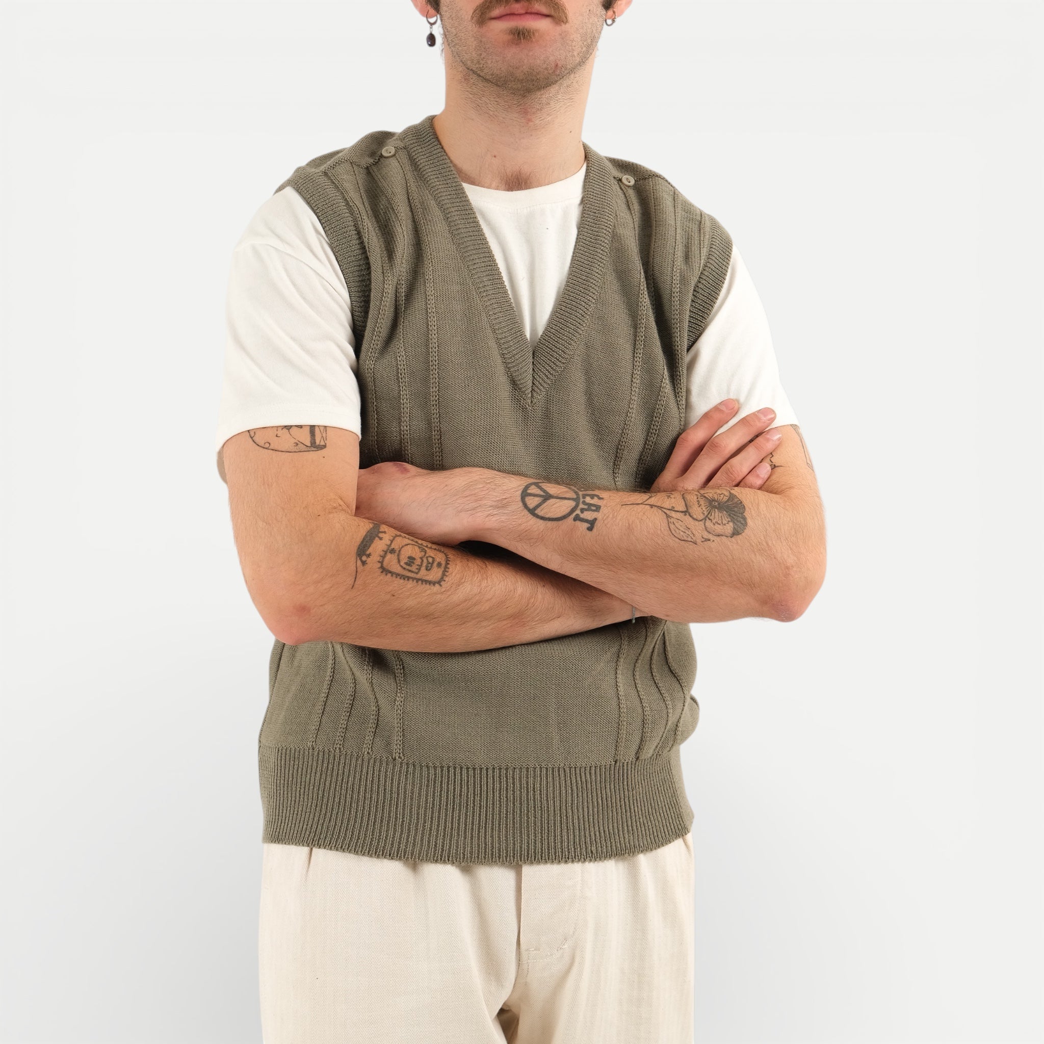 Men's olive green V-neck sweater vest with shoulder buttons