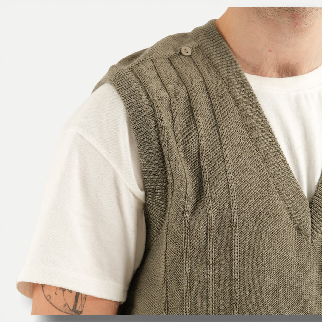 Men's olive green V-neck sweater vest with shoulder buttons