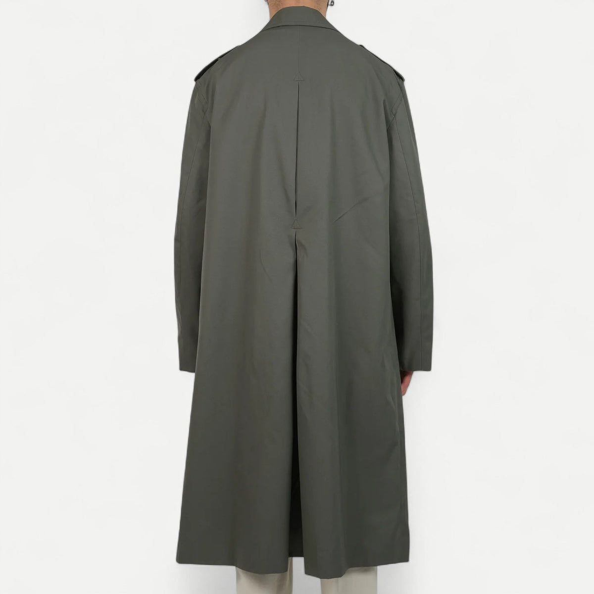 Men's muted green long raincoat with button front, pointed collar and shoulder tabs
