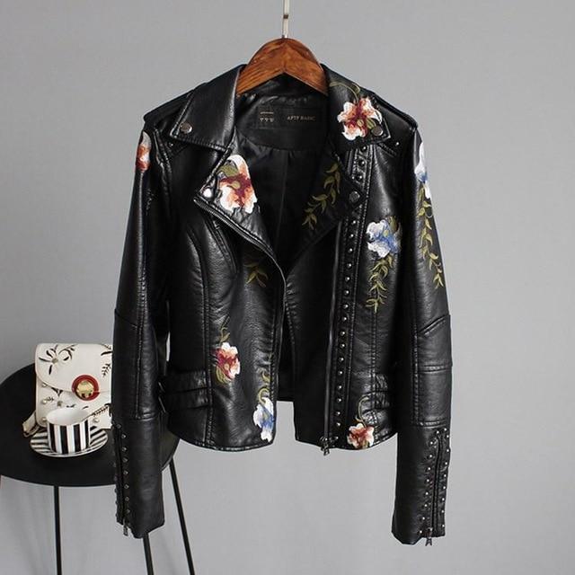 Women's floral biker jacket with studded trim and long sleeves