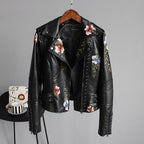 Women's floral biker jacket with studded trim and long sleeves
