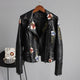 Women's floral biker jacket with studded trim and long sleeves