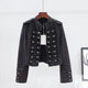 Women's cropped denim jacket with stand collar, shoulder tabs and rows of button detailing