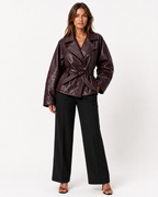 Women's belted collared leather jacket with zip pockets