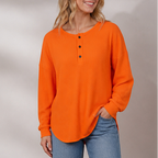Women's waffle knit henley top with long sleeves and button placket