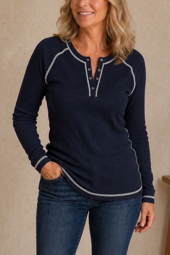 Women's long-sleeve waffle knit Henley top with contrast stitching and button placket