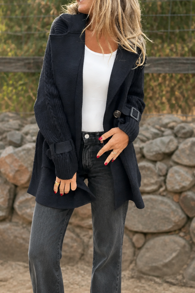 Women's longline double-breasted coat with knitted sleeves and buckle cuffs