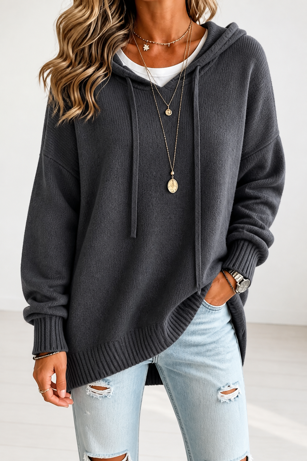Women's oversized hooded knit sweater with drawstring ties