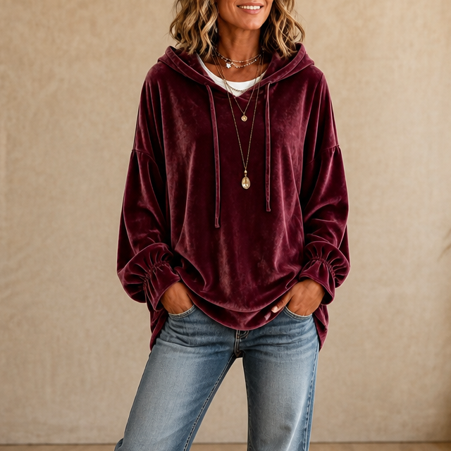 Women's relaxed velvet hoodie with drawstring hood and gathered cuffs