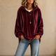 Women's relaxed velvet hoodie with drawstring hood and gathered cuffs