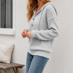 Women's ribbed knit hooded jumper with button front and long sleeves