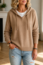 Women's hooded ribbed knit pullover with drawstrings and long sleeves