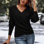 Women's crossover wrap knit top with V-neckline and long sleeves