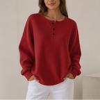 Women's waffle knit henley top with long sleeves and button placket