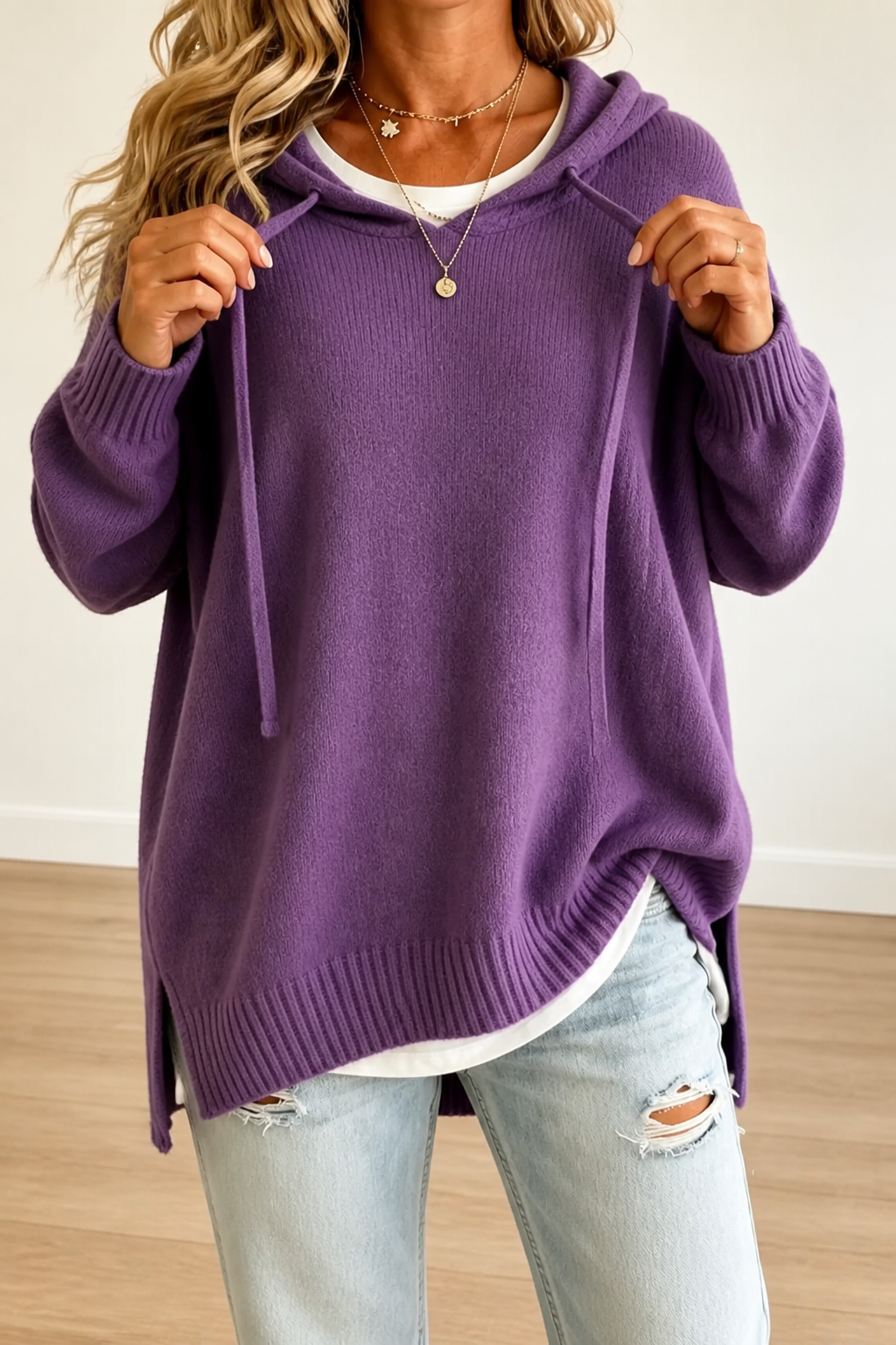 Women's oversized hooded knit sweater with drawstring ties
