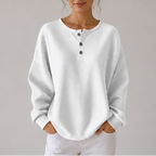 Women's waffle knit henley top with long sleeves and button placket