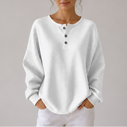 Women's waffle knit henley top with long sleeves and button placket