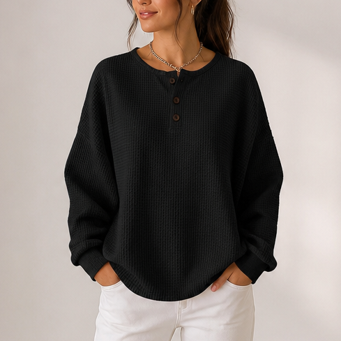 Women's waffle knit henley top with long sleeves and button placket