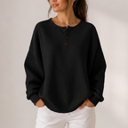 Women's waffle knit henley top with long sleeves and button placket