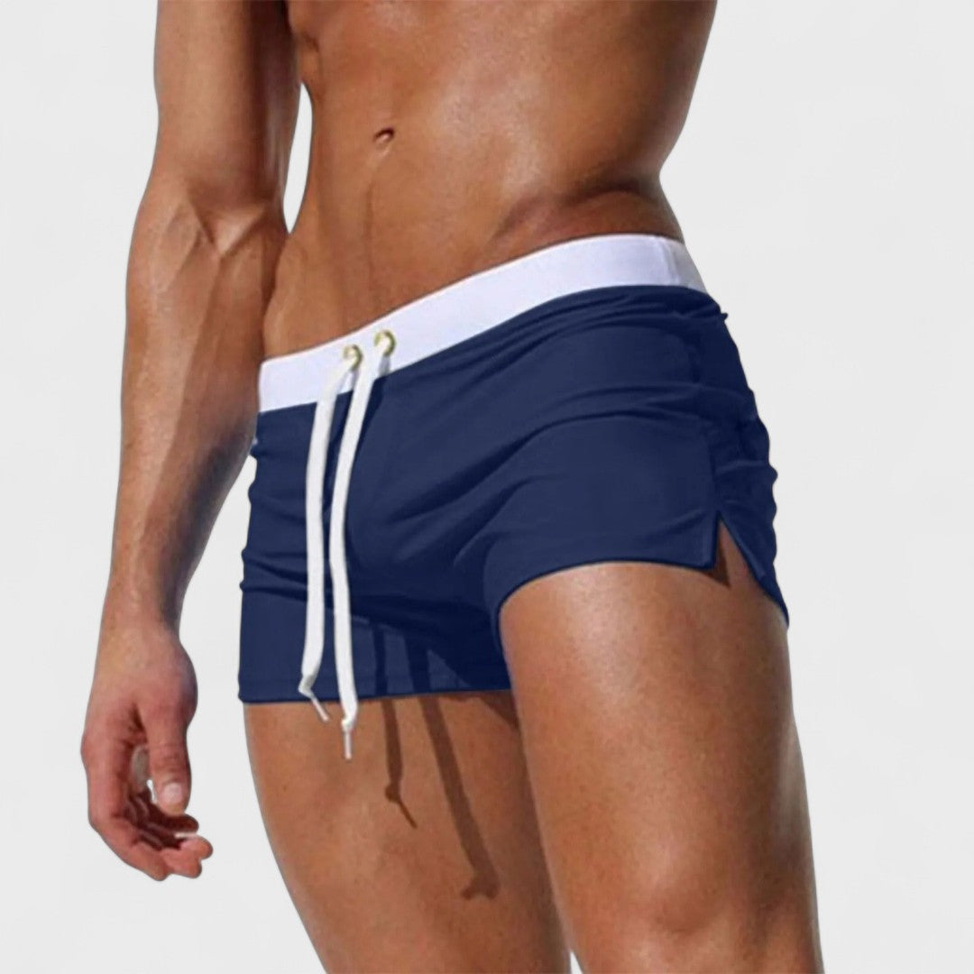 Men's mid-length swim shorts with drawstring waist in white and contrast trim