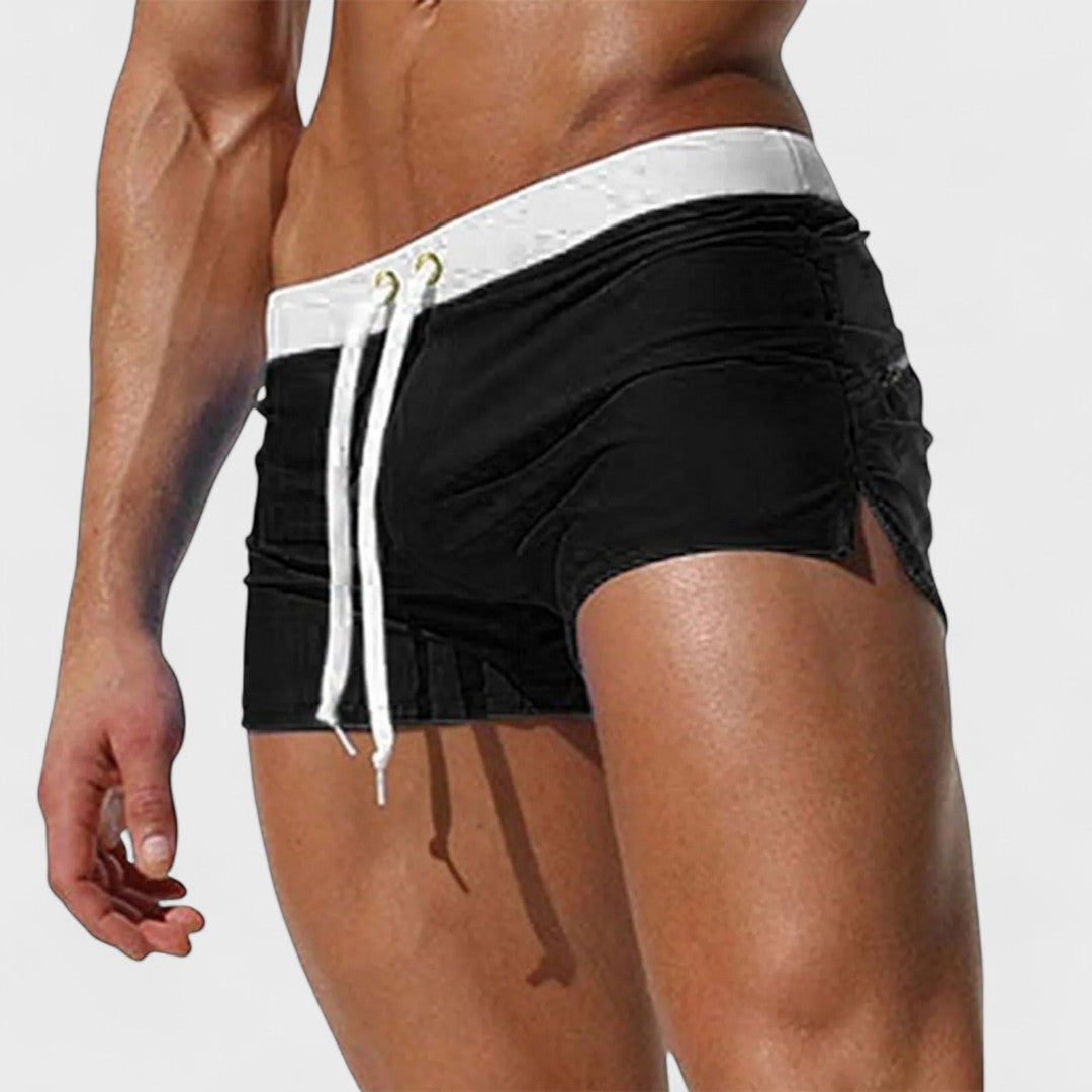 Men's mid-length swim shorts with drawstring waist in white and contrast trim