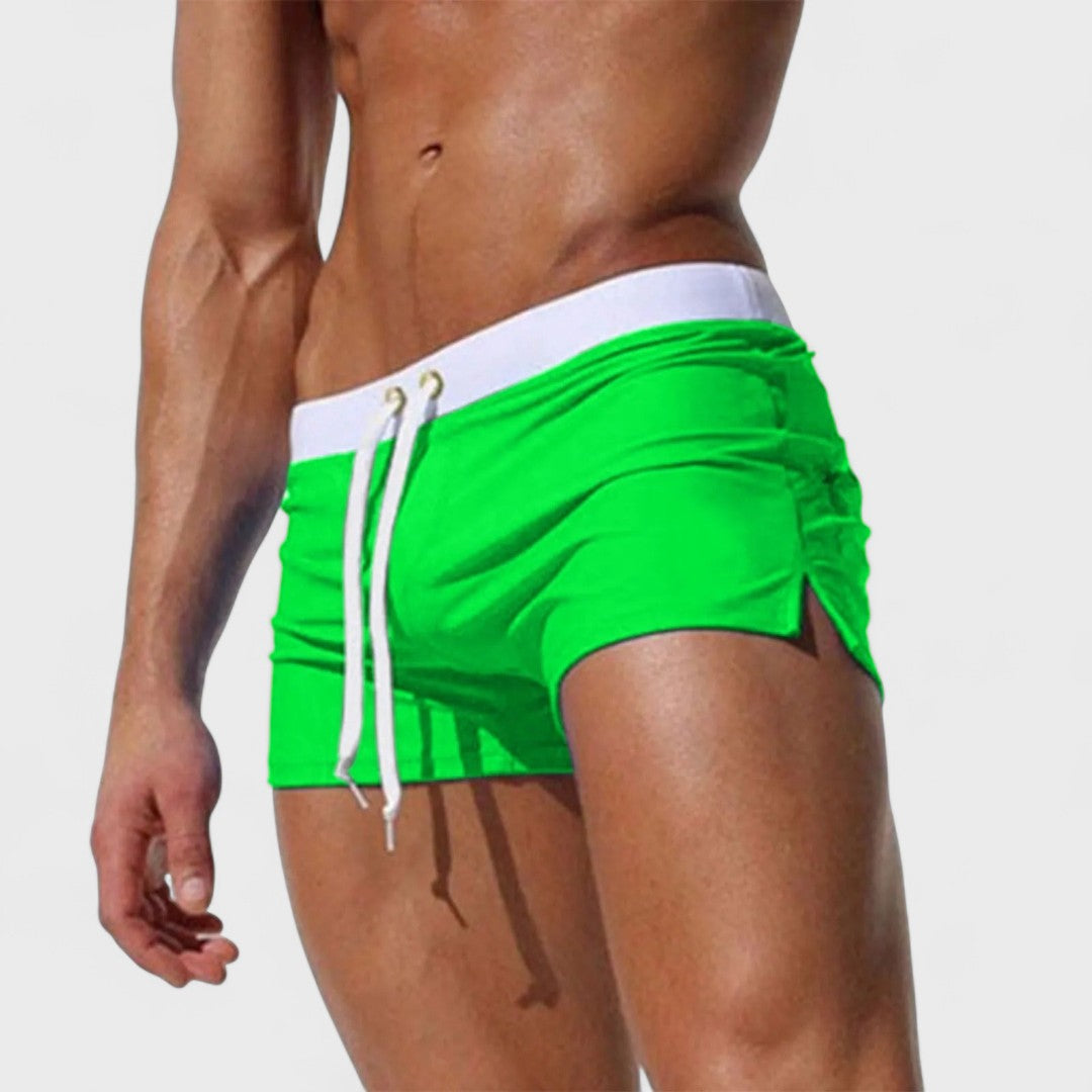 Men's mid-length swim shorts with drawstring waist in white and contrast trim