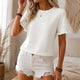 Women's textured crew neck top with short flutter sleeves