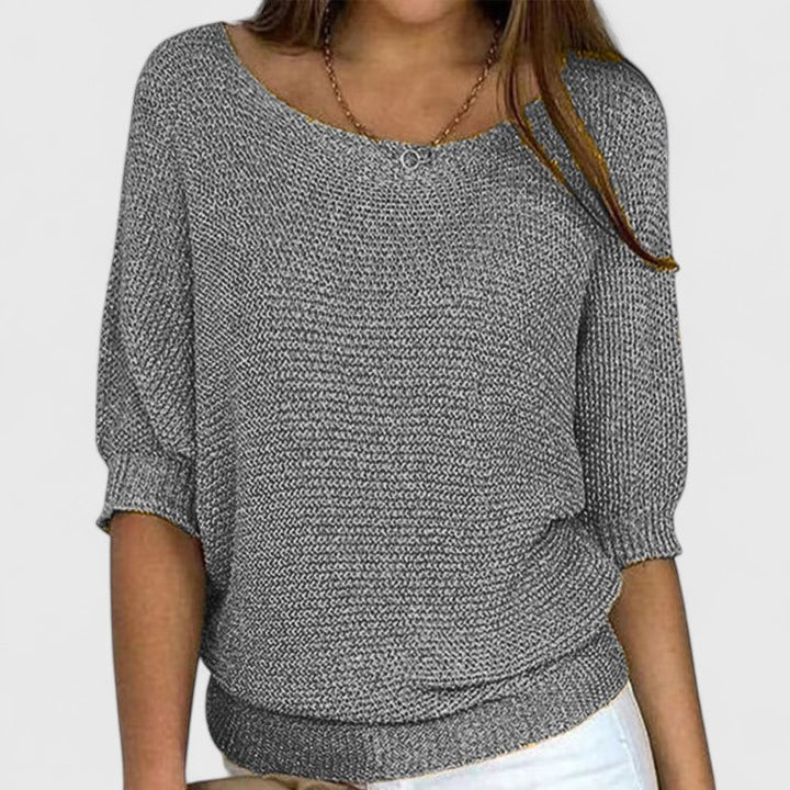 Women's textured knit pullover with round neckline and three-quarter sleeves