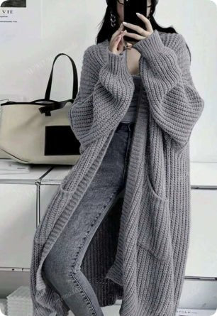 Women's long ribbed knit cardigan with open front, shawl collar and front pockets