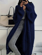 Women's long ribbed knit cardigan with open front, shawl collar and front pockets