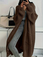 Women's long ribbed knit cardigan with open front, shawl collar and front pockets