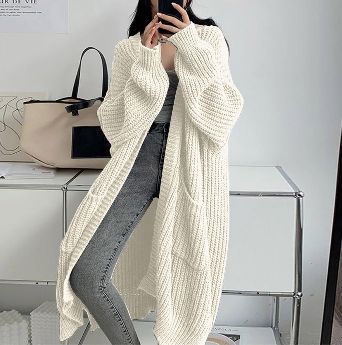 Women's long ribbed knit cardigan with open front, shawl collar and front pockets