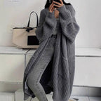 Women's long ribbed knit cardigan with open front, shawl collar and front pockets