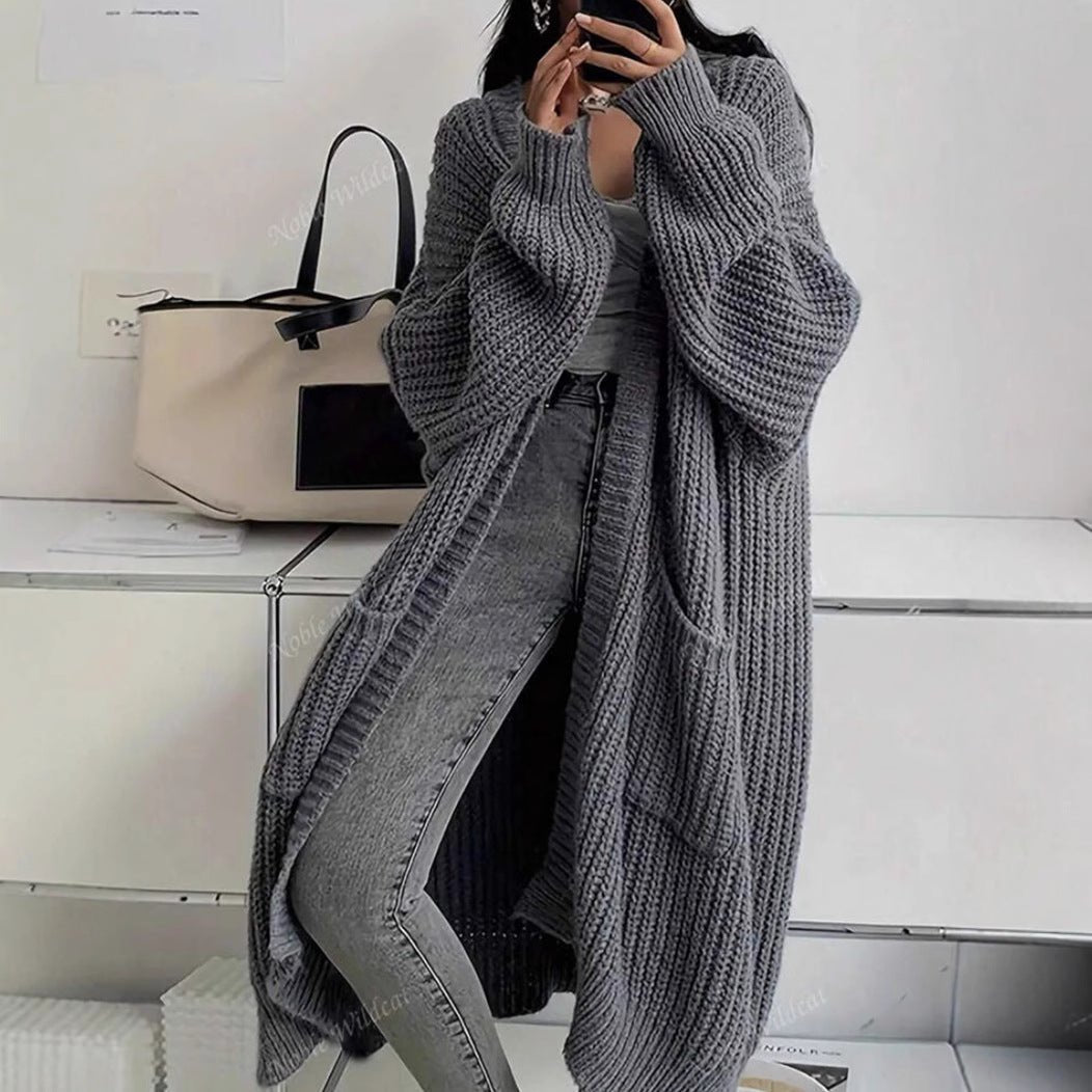 Women's long ribbed knit cardigan with open front, shawl collar and front pockets