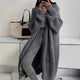 Women's long ribbed knit cardigan with open front, shawl collar and front pockets