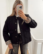Women's quilted jacket with leopard-print cuffs and button front