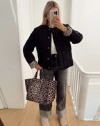 Women's quilted jacket with leopard-print cuffs and button front